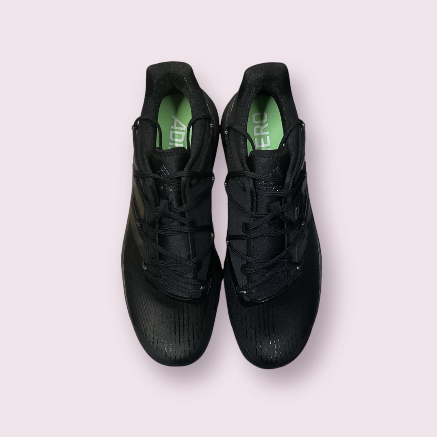 Zapatillas de béisbol Adizero Afterburner 8 en negro, ligeras y transpirables, con suela de tacos para máxima velocidad y tracción en el campo
