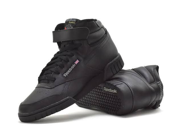 Tenis Reebok Ex-O-Fit de cuero negro con diseño retro y ajuste cómodo, ideales para estilo casual.