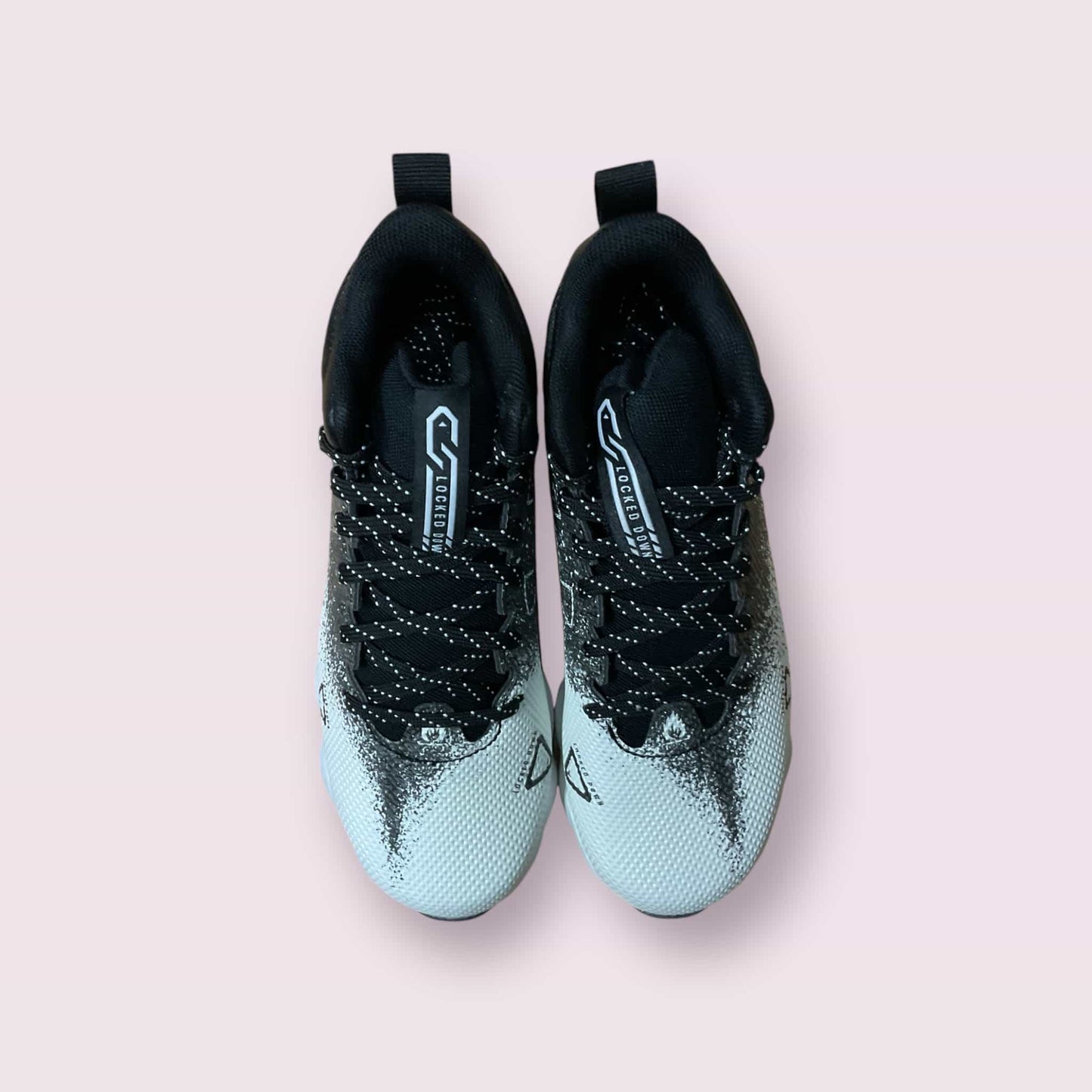 Botines UA Spotlight Fran RM 2.0 negros para fútbol y béisbol jóvenes jugadores