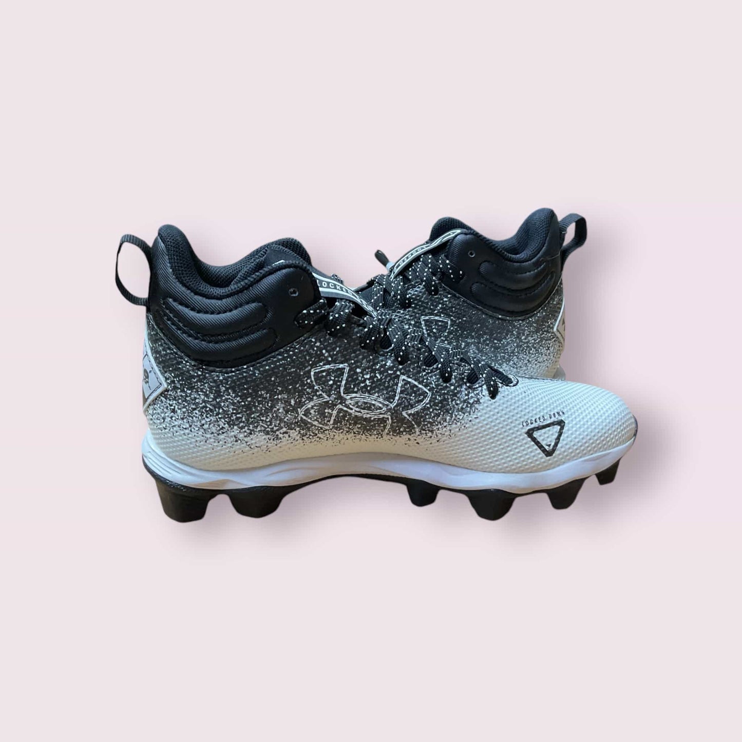Botines UA Spotlight Fran RM 2.0 negros para fútbol y béisbol jóvenes jugadores