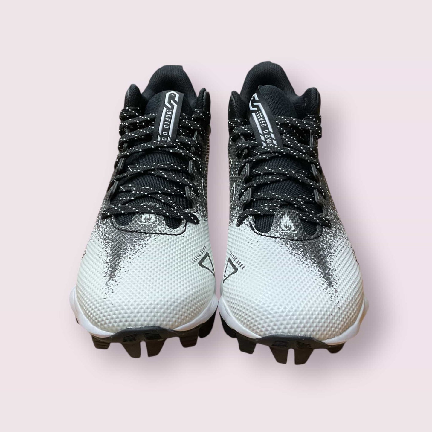 Botines UA Spotlight Fran RM 2.0 negros para fútbol y béisbol jóvenes jugadores