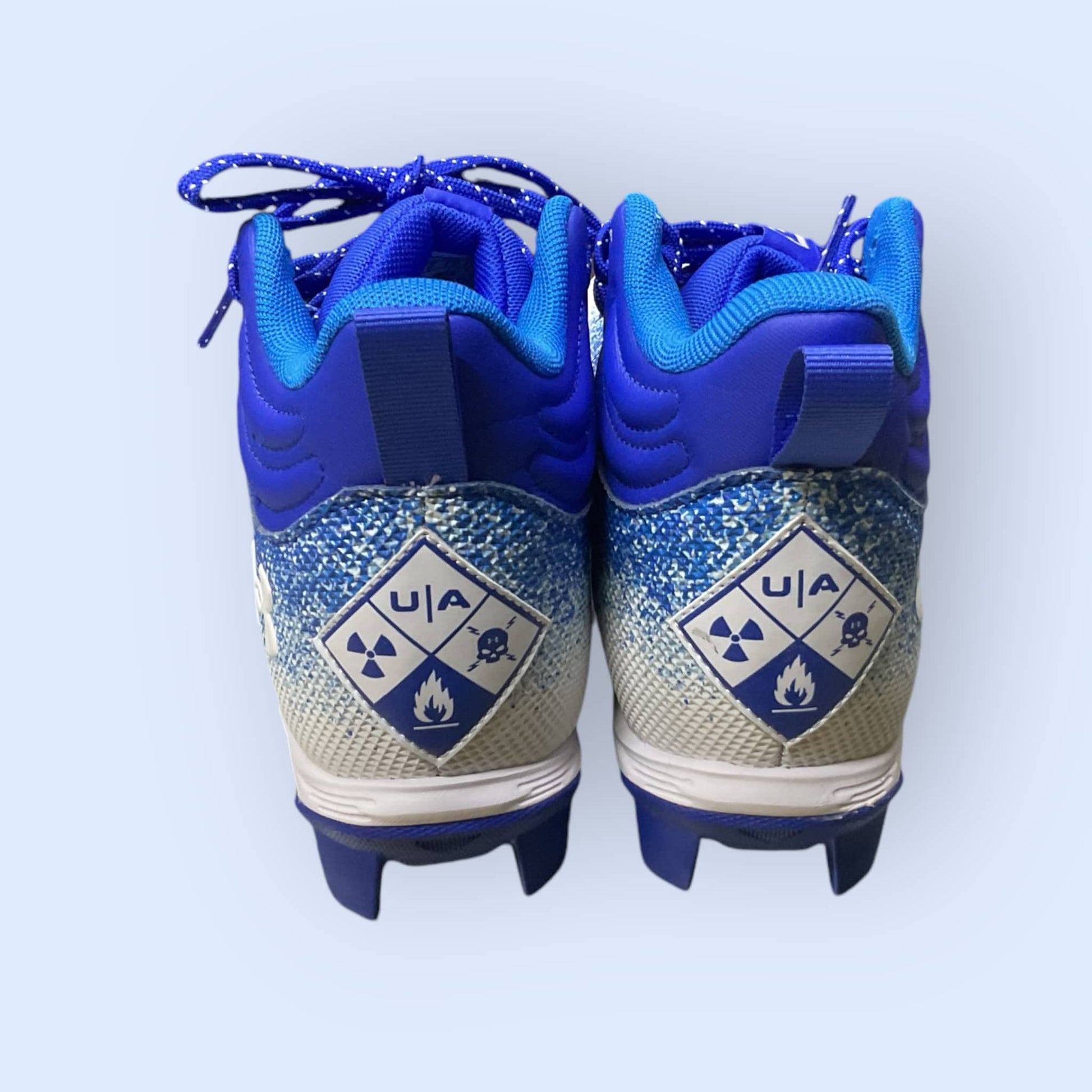 Zapatillas UA Spotlight Fran RM 2.0 en color azul, ideales para correr y entrenar, con diseño moderno, parte superior transpirable y suela de goma para un agarre superior.