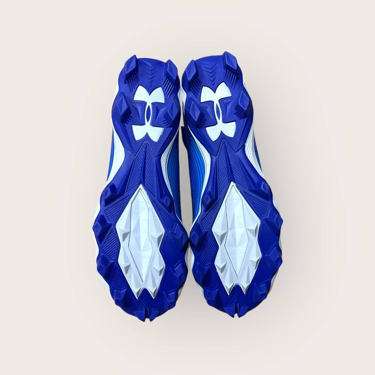 Zapatillas UA Highlight Franchise Azul con tecnología ClutchFit para fútbol y béisbol, en color azul.