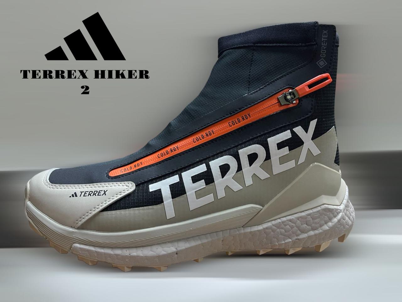 Botas Adidas Terrex Hiker 2 negras, diseñadas para senderismo, con suela de gran tracción y diseño resistente.