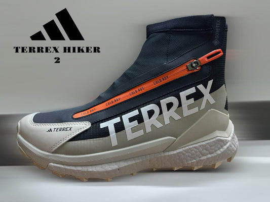 Botas Adidas Terrex Hiker 2 negras, diseñadas para senderismo, con suela de gran tracción y diseño resistente.