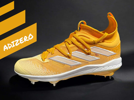 Zapato Adizero Afterburner amarillo, ultraligero y diseñado para velocidad, tracción y estilo en el béisbol.